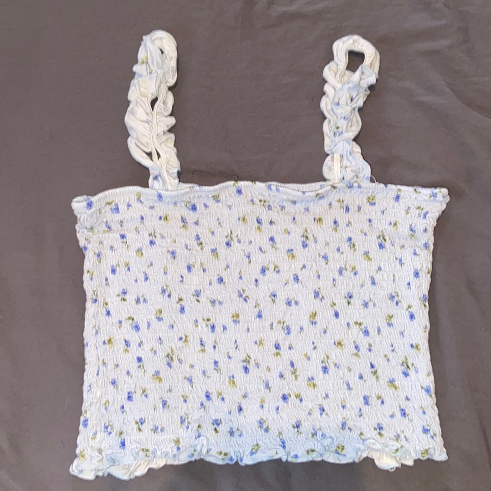 Light blue tank top with ruffles is from forever 21 and it’s a size Large
